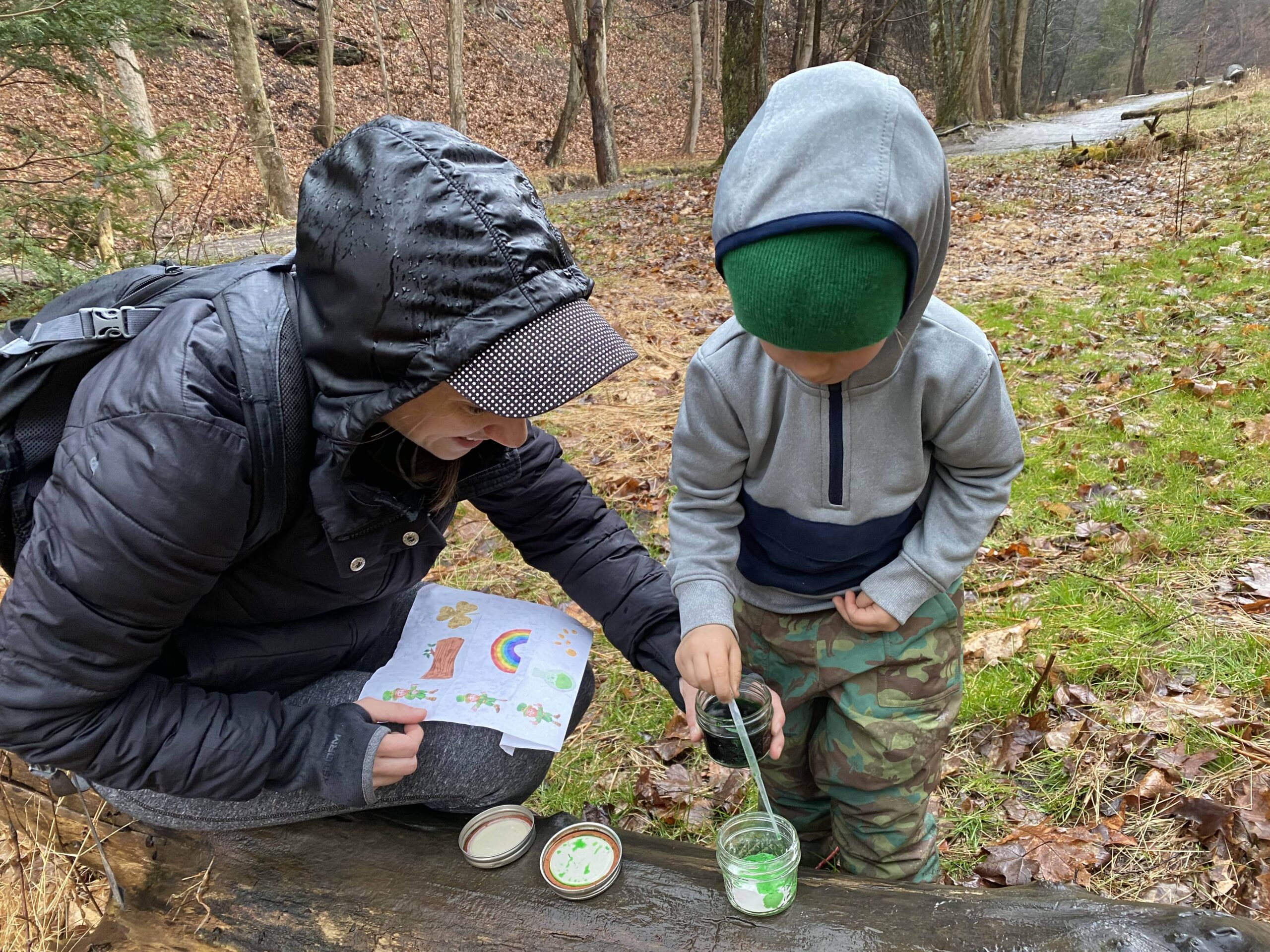 occupational therapist working with a child outdoors